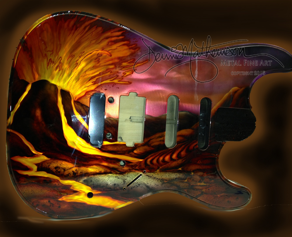 Artwork hand carved on aluminum for this custom guitar commission by Dennis Mathewson